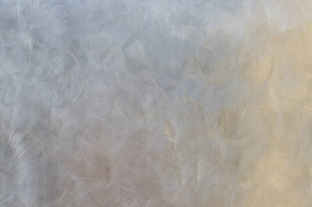 Metal wall - pastel abstract reflections "Metal wall detail - pastel abstract reflection, brushed effect" brushed metal stock pictures, royalty-free photos & images