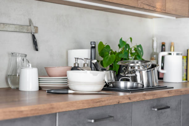 istock Dirty dishes and unwashed kitchen appliances filled the kitchen sink 1729146258