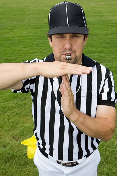 Referee Series:  Time Out Time out hand signal. Please view these along with all time out signal stock pictures, royalty-free photos & images