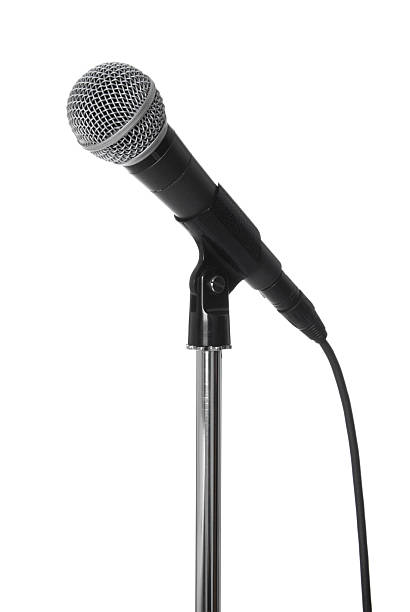 Lone microphone on stand on white Microphone on a white Background. microphone stand photos stock pictures, royalty-free photos & images