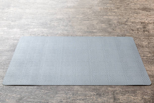 istock Perspective view of grey tablecloth for food on cement background. Empty space for your design 1729164269