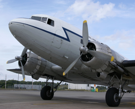 This picture shows the classic lines of the venerable Douglas DC-3 Dakota aircraft. this one is in RAF Transport Command livery and is on the pan at Bristol airport