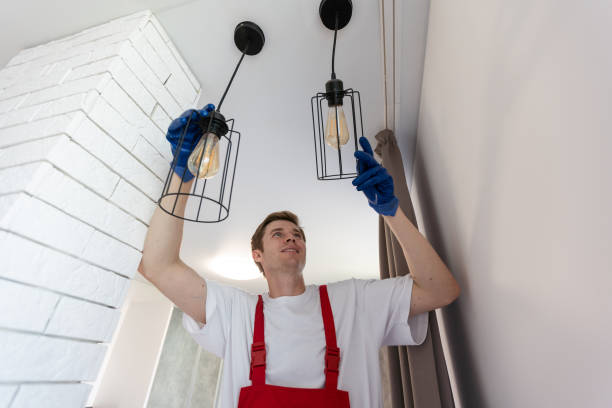 istock man changing led ceiling lamp in new house 1729167229