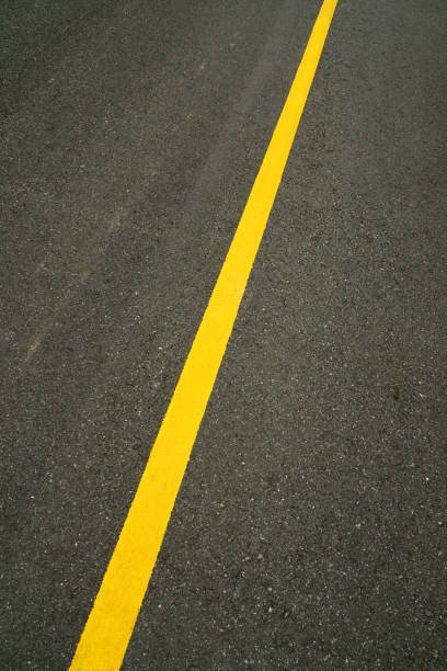 istock Yellow Line on Blacktop Road 172917914