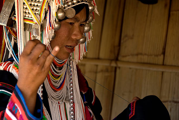istock Akha Woman Hand Sewing 172918569