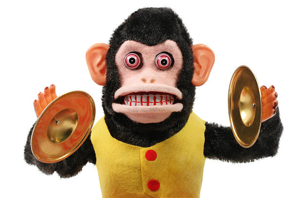 Cymbal Playing Monkey 1950's retro Cymbal-Playing Monkey in very good shape on a white background. ugly face stock pictures, royalty-free photos & images