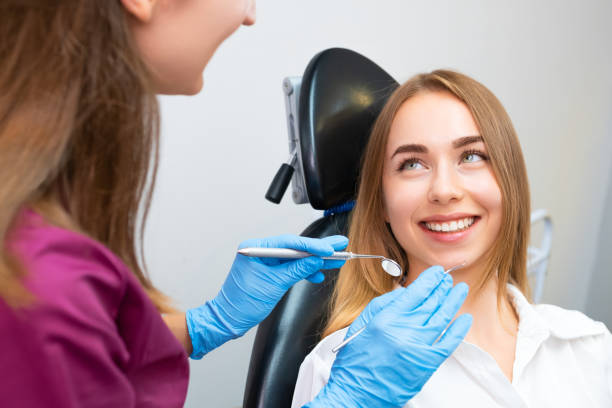 istock Beautiful woman patient visiting dentist for teeth check up 1729204263