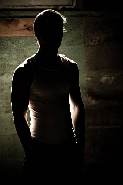 istock Portrait of Young Man in Shadows 172921281