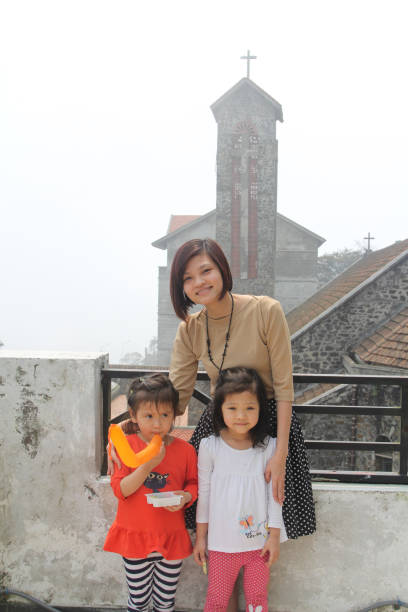The woman takes her kids to countryside