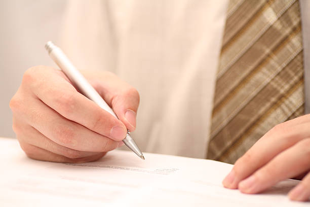 istock Businessman viewing the contract before signing 172922226