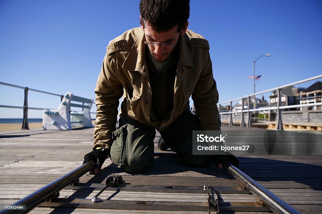 Grip edificio Dolly traccia - Foto stock royalty-free di Adulto