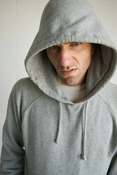 istock Snarling Man in Hoody 172924290