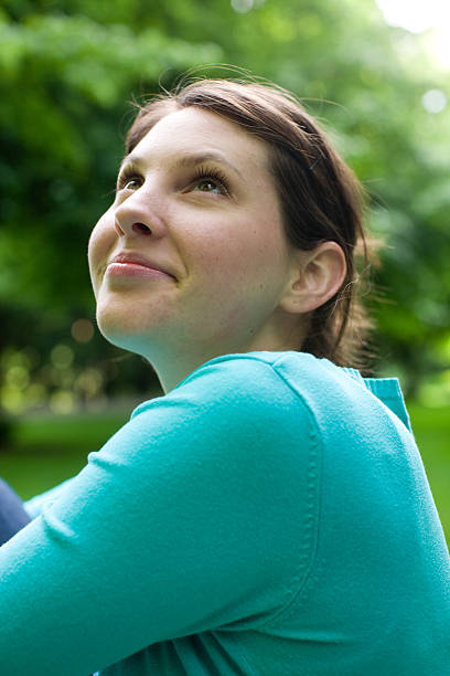 istock beautiful woman in park 172925040