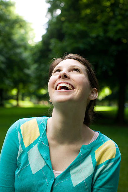 istock beautiful woman in park 172925410