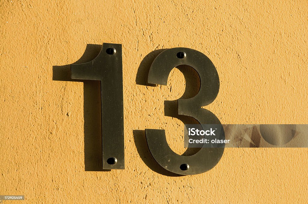 Door number thirteen Sunset on the door number 13. More Facade pictures below Number 13 Stock Photo