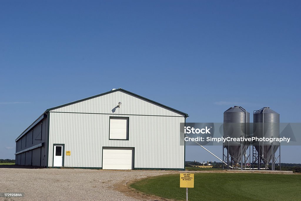 Poultry Barn Poultry barn for chickens with Bio-Security signs posted to prevent diseases. Agricultural Building Stock Photo