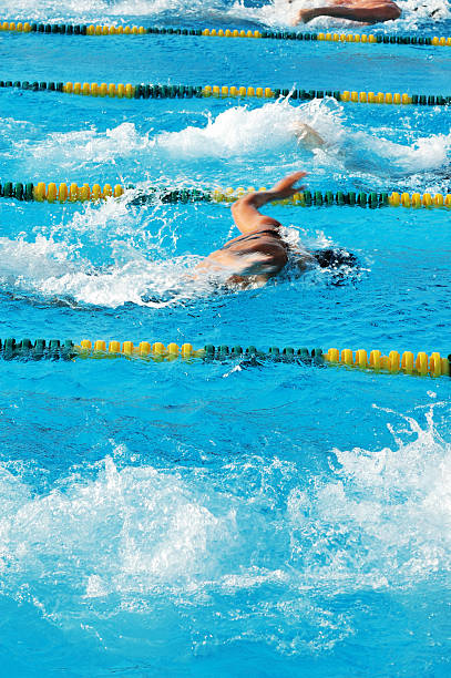 istock Female Butterfly Swimmers Racing to Finish 172925873