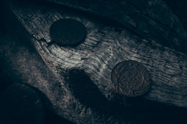 istock Numismatics. Old collectible coins on the table. Top view. 1729269104