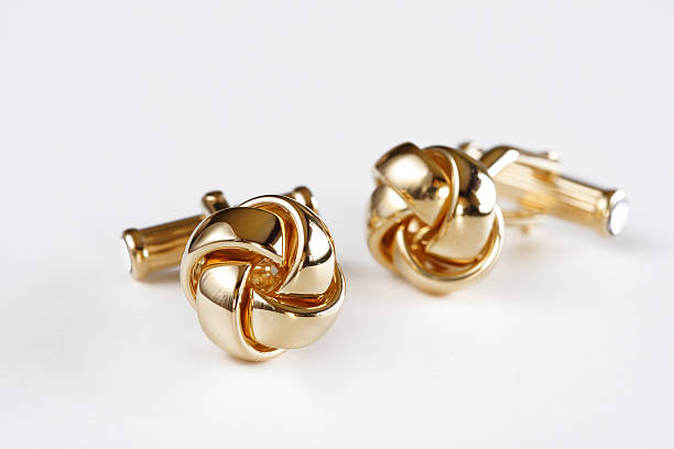 Gold Cuffs Elegant Gold cuffs cufflink stock pictures, royalty-free photos & images