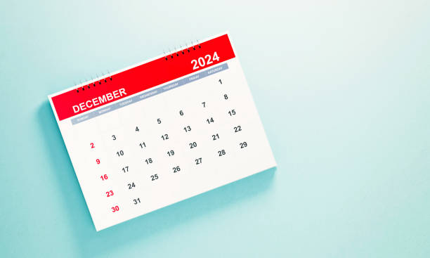 istock 2024 December Calendar on Blue Background 1729272403