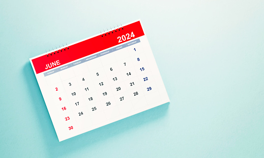 2024 June calendar on blue background. Horizontal composition with copy space. Calendar and reminder concept.