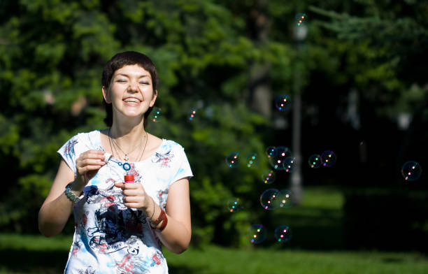 istock Laughing girl with soap bubbles 172927719
