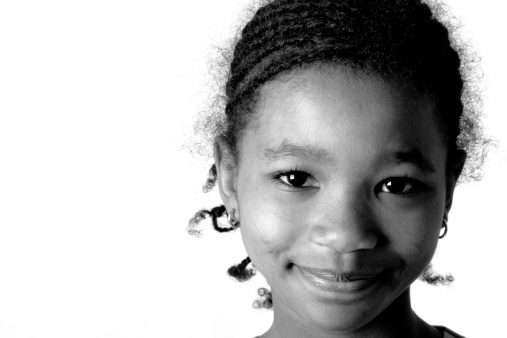 Smiling Girl, white background. Black and white image. 