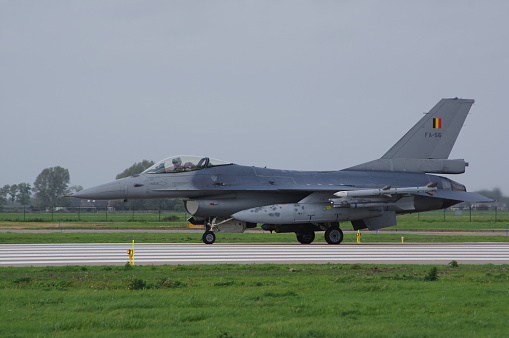 Lockheed martin F-16 AM fighting falcon from Belgian air force armed with aim-9 sidewinders and AIM-120 AMRAAM air to air missiles  ready for take off at Leewarden air base during exercise frisian flag the netherlands