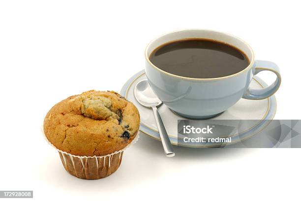 A Blueberry Muffin And A Black Coffee On A White Background Stock Photo - Download Image Now