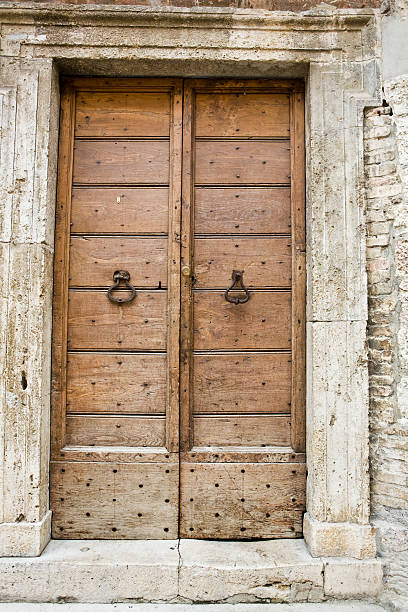 istock ancient brown wooden door 172928640