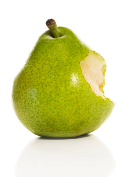 Biten Pear 120+ Green Pear With Missing Bite Stock Photos, Pictures & Royalty-Free ...