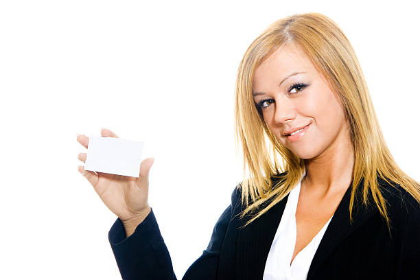 Businesswoman with a card stock photo