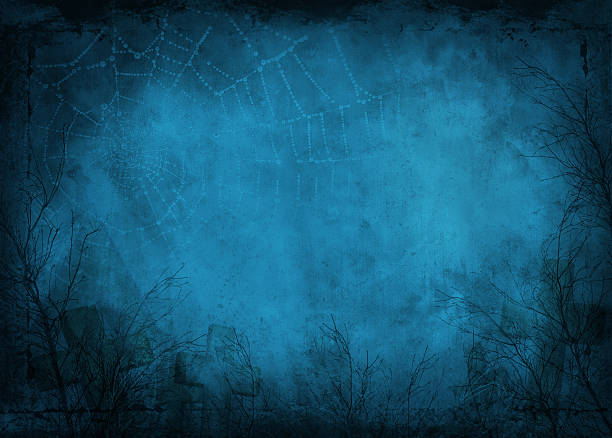 Foggy night view, of bare branches covered in spider webs