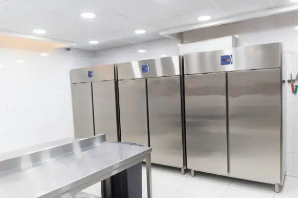 a room with refrigeration equipment for cutting meat.A place to store meat for a restaurant