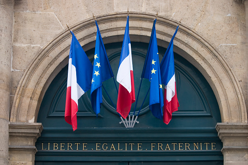 The motto of the French Republic, Liberty, Equality and Fraternity, with the French flag, Le Tricoleur and the European EEC Flag. The motto can also be found on French, One Euro Coins.