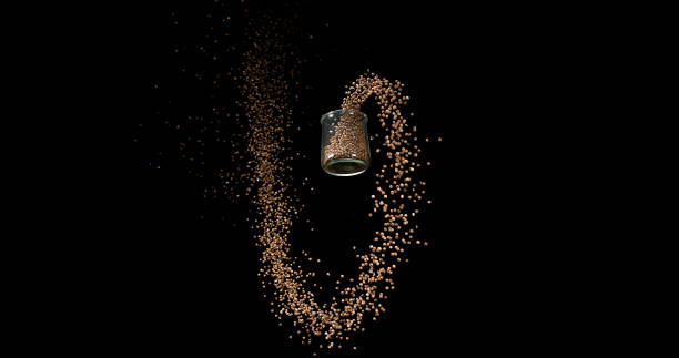 istock Coriander, coriandrum sativum, seeds falling against Black Background 1729304929