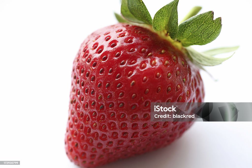Strawberry "Close-up of a strawberry, isolated on white background.Similar images -" Clean Stock Photo