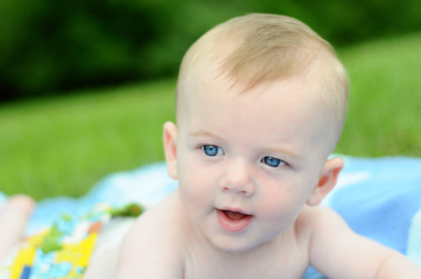 Baby With Blue Eyes stock photo