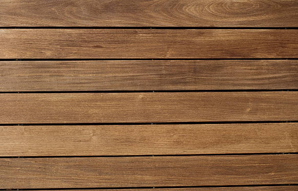 Natural Wood flooring, Background. Stained Wooden textured Background. deck stock pictures, royalty-free photos & images