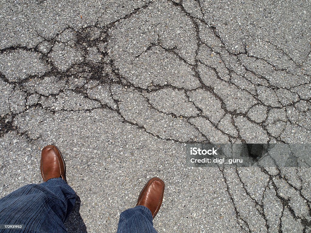 Fissures dans la route - Photo de Craquelé libre de droits