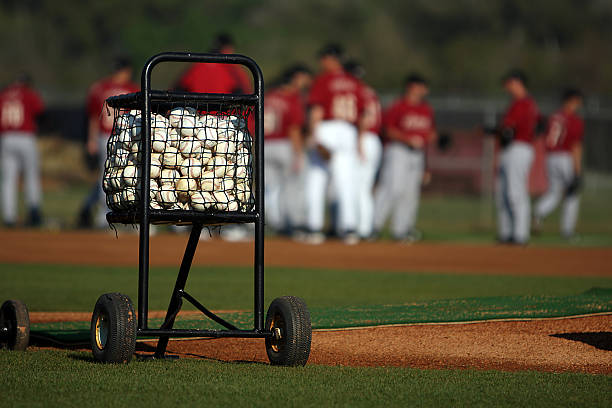 Cart of Baseballs Cart bucket of baseballs at Spring Training. baseball baseballs spring training professional sport stock pictures, royalty-free photos & images