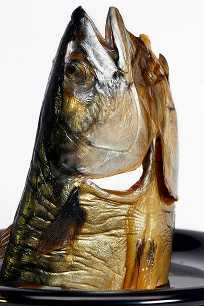 istock Smoked Mackerel fish on black Saucer 172932752