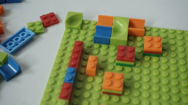 istock Plastic building blocks on a white background, close-up. 1729327660