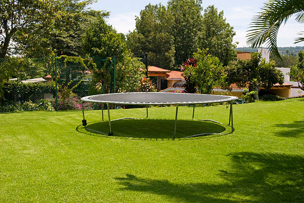 Trampoline in a garden Trampoline in a garden. cuernavaca stock pictures, royalty-free photos & images