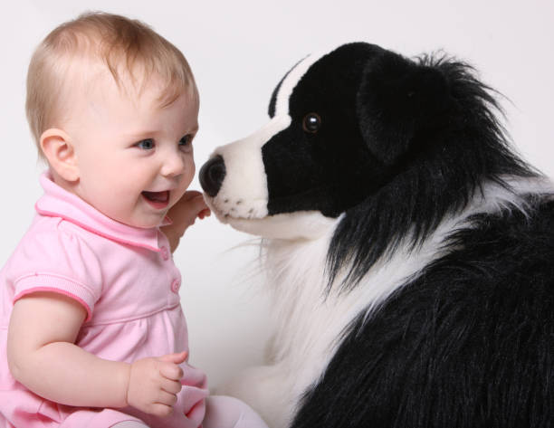 istock Baby and Stuffed Dog 172933872