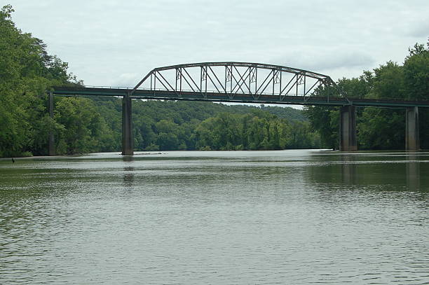 Bridge A lonely bridge over the Tennessee River.PLEASE SEE MY OTHER ITEMS OF ARCHITECTURE tressle stock pictures, royalty-free photos & images