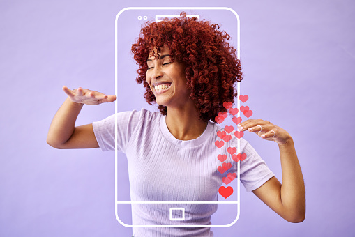 Studio, woman influencer and social media icon  to like, subscribe and review online with smile. Frame, face and streamer girl on purple background with notification emoji on phone for networking app