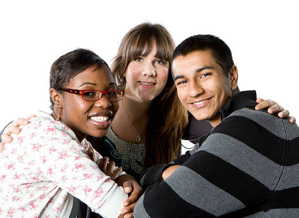 istock Three teenage friends huddled together 172936487