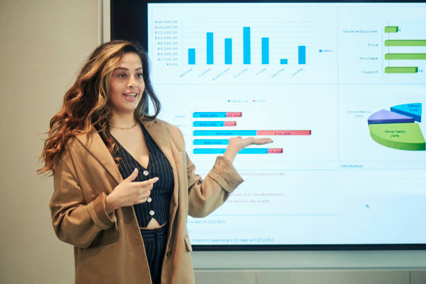 istock Woman standing in front of a projection screen 1729365716