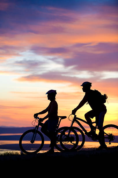istock Mountain Biking Couple Enjoying Sunset View 172937406